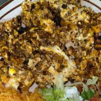 Order Of Eggs W/ Chorizo · 3 scrambled eggs with chorizo. Comes with rice, beans, and lettuce topped with tomatoes & ra...