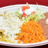Order Of Enchiladas · Tortillas covered in red or green salsa topped with mozzarella and fresh cheese, with your c...