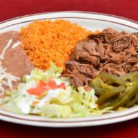 Barbacoa Platter · Barbacoa de res platter comes with jalapeños, rice &  beans topped with cheese.