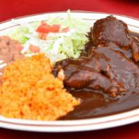 Guerrero-Style Mole · Comes with rice & beans topped with cheese.