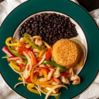 Shrimp Fajita Plate · Shrimp sauteed with bell peppers, onions, and served with pico de gallo, rice, beans and tor...