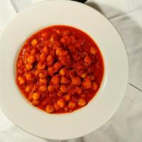Chana Masala · Gluten-free, vegan. A North Indian specialty subtly flavored chickpeas tempered with ginger ...
