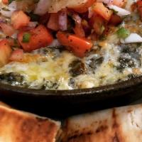 Spinach & Artichoke Dip · Roasted artichokes, spinach, cream cheese parmesan, and mozzarella served with grilled pita ...