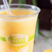 Tropical Peach · Coconut water, mango sorbet, peach, pineapple, agave