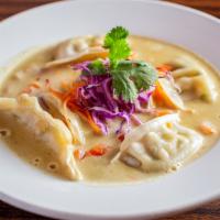 Steam Curry Dumpling · Spicy. Steamed dumpling, salsa, carrot, red cabbage, cilantro in green curry.
