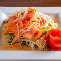 Papaya Salad · Spicy. Shredded green papaya, carrot, green beans, sliced tomatoes and lime juice tossed wit...