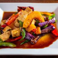 E.T · Spicy. Pumpkin, eggplant, tofu stir fried in garlic sauce with bell pepper, basil and chili.