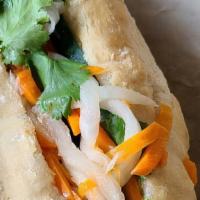 Pork Belly Banh Mi · Tender thick-cut Pork Belly, seared to order, Sweet Chili Sauce, Shallots.