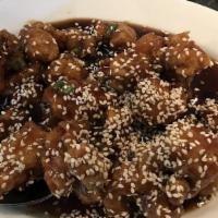 Sesame Chicken · Lightly breaded chicken tossed in a sesame sauce, topped with sesame.