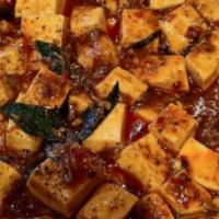 Ma Po Tofu · Spicy. Diced tofu boiled in minced pork, szechuan spicy sauce.