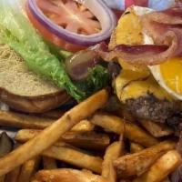 Helluva Hangover · A burger with cheddar cheese, bacon,. your choice of egg & hash browns.. Good any time of th...