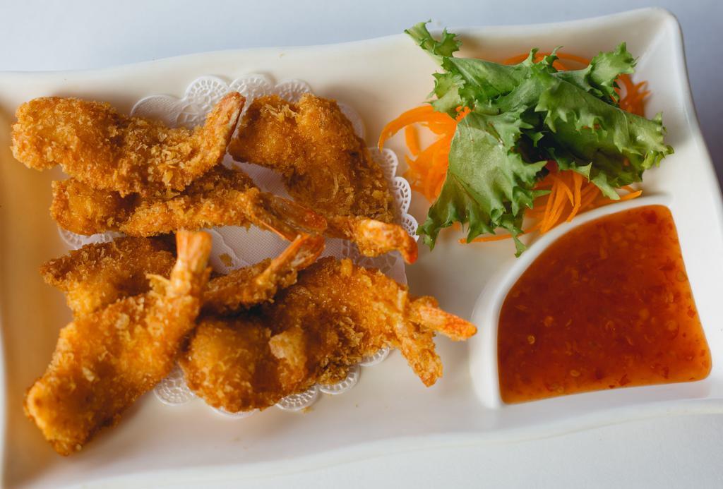 Golden Butterfly Shrimp · 6 butterfly shrimp fried to golden brown served with katsu sauce.