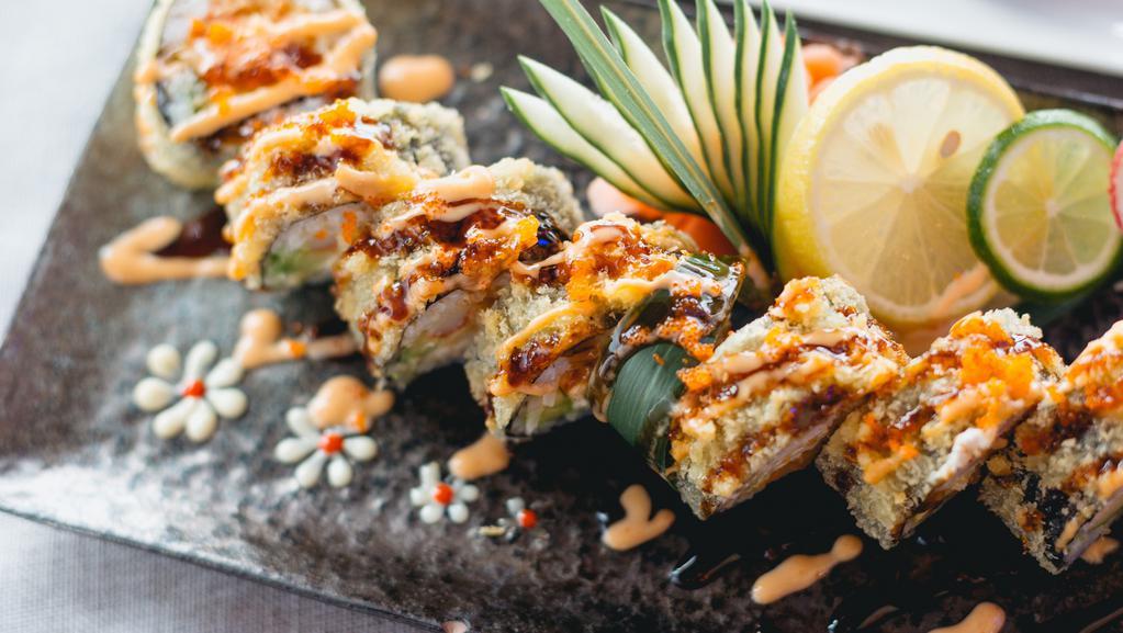 Delicious Roll · Crab, cream cheese, avocado, cucumber, spicy tuna inside. Deep fried and topped with spicy mayo and eel sauce.