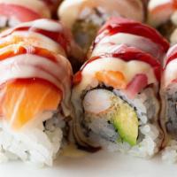 Ichiban Roll · Tempura shrimp inside topped with tuna, yellowtail, salmon, avocado, wasabi mayo and eel sau...