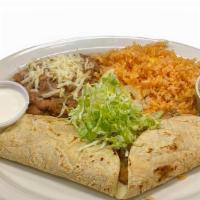 Cheese Quesadillas · 2 Quesadillas filled with cheese on corn tortillas.  Mexican rice & pinto beans.  Sour Cream...