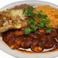 Camarones Ala Diabla · Sauteed shrimp in a spicy chipotle sauce.  Mexican rice, pinto beans, guacamole & pico de ga...