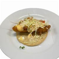 Baja Fish Taco · Battered tilapia tacos.  Topped with chipotle mayo, cabbage and Pico de gallo.