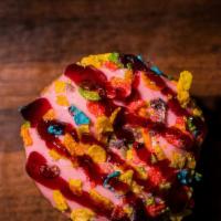 Fruity Tutti · Strawberry glaze topped with fruity pebbles and raspberry drizzle.