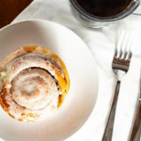Giant Cinnamon Roll · Indulge in this fresh baked “monster” cinnamon roll lavished with rich cream cheese icing an...