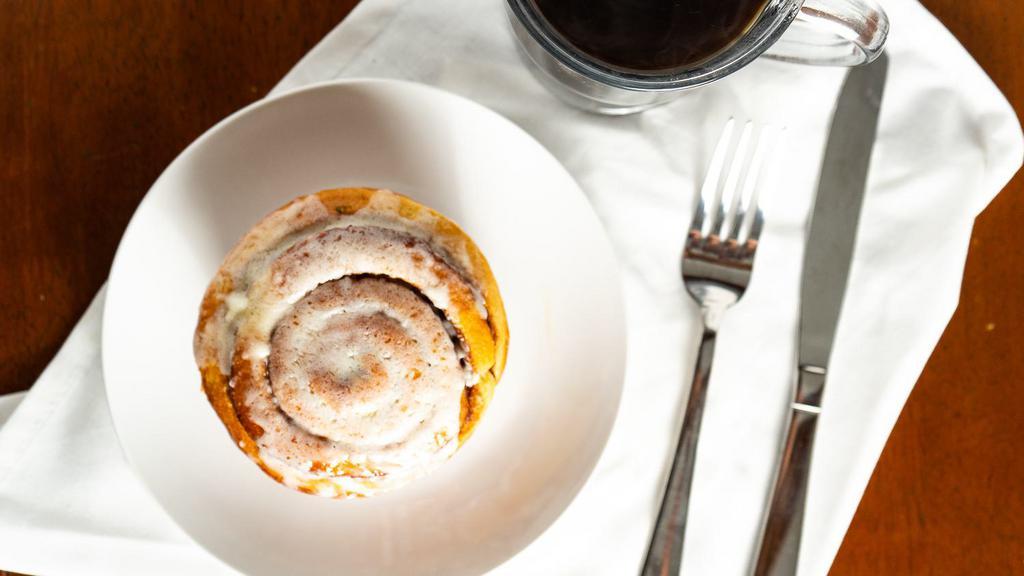 Giant Cinnamon Roll · Indulge in this fresh baked “monster” cinnamon roll lavished with rich cream cheese icing and served warm.