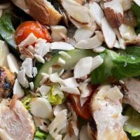 Honey Chicken Salad · Sliced chicken breast, mixed greens, grilled chicken, almonds, cherry tomato, cucumbers and ...
