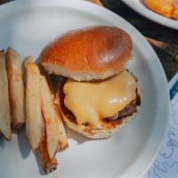 Kids Cheese Burger · With american cheese.