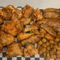 Shack Meal 4 · 2 Whole Chickens, 1 Family Size Wedges & choice of two family or pint sides.