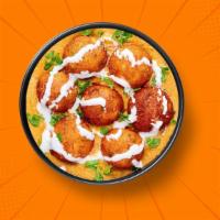 Majestic Malai Kofta  · 14 oz. Cottage cheese balls cooked in thick, nutty cashew, raisin gravy with and finished wi...