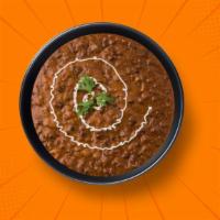 Creamy Black Dal  · 14 oz. Slow-cooked mixed black lentil, tempered with tomatoes, onions, butter, Indian spices...