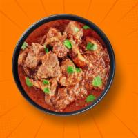 Capital Lamb Curry · 14 oz. Tender chunks of lamb simmered in a brown onion and tomato curry, seasoned with fresh...
