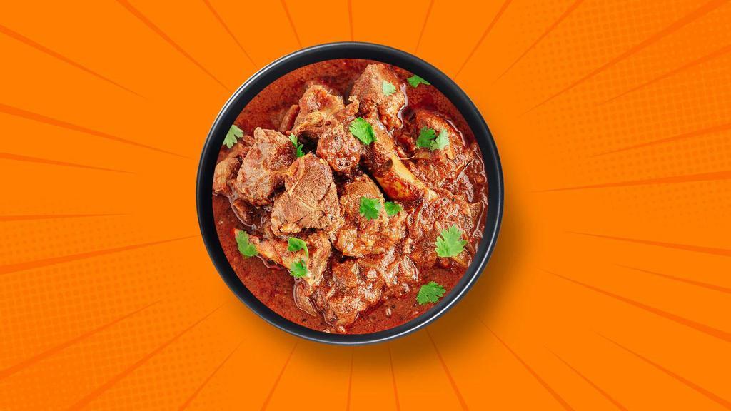 Capital Lamb Curry · 14 oz. Tender chunks of lamb simmered in a brown onion and tomato curry, seasoned with fresh herbs and whole Indian spices. Served with a side of aromatic white rice.