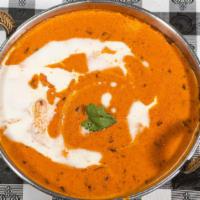 Butter Chicken  · Gravy dish of chicken in a mildly spiced tomato sauce.