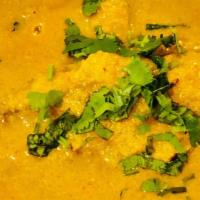 Fish Curry  · Fish cooked in a spicy gravy made with onion, tomato, fresh coconut paste, red chili paste, ...