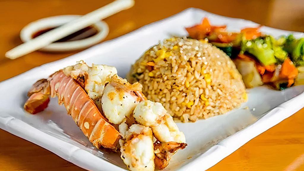 Hibachi Lobster Tail · 2 lobster tail hibachi grilled ,with fried rice, cabbage, and 2 sauce.