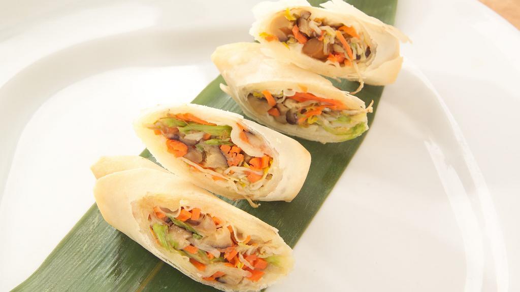 Spring Roll (2 Pcs) · Deep fried vegetable roll.