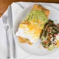 # 16 Chimichanga Plate · Fried burrito, chicken or beef. Served with rice and beans