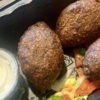 Side Of Kibbeh Balls · Ground lamb and beef mixed with cracked wheat and spices, stuffed with sautéed lamb, onion, ...
