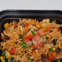 Mexican Fried Rice · A single serving of stir-fried rice with corn, black beans, onions, peppers, tomato and spices