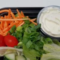 Green Side Salad · Romaine and iceberg with cucumber, tomato, carrot and scallion with ranch dressing.