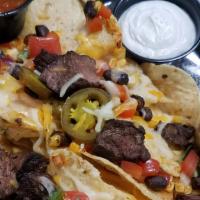 Maria'S Nachos & Queso · Corn tortilla chips baked with shredded cheese, black bean-corn salsa, jalapeno and pico de ...
