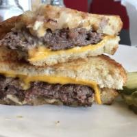 Patty Melt · Grilled rye, onion, Swiss and American cheese.