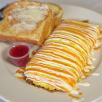 Mexican Omelet · 3 egg omelet with housemade Chorizo , Green Pepper, Onions, Tomatos, 
Topped with Sour Cream...
