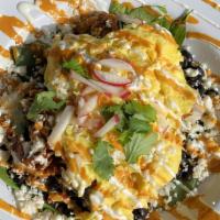 Mexican Bowl · Beef barbacoa, braised pork, or chicken. 

layered with Rice, Black beans, Green peppers, pi...