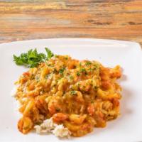 Crawfish Etouffee · Crawfish smothered in a buttercream sauce served over white rice.
