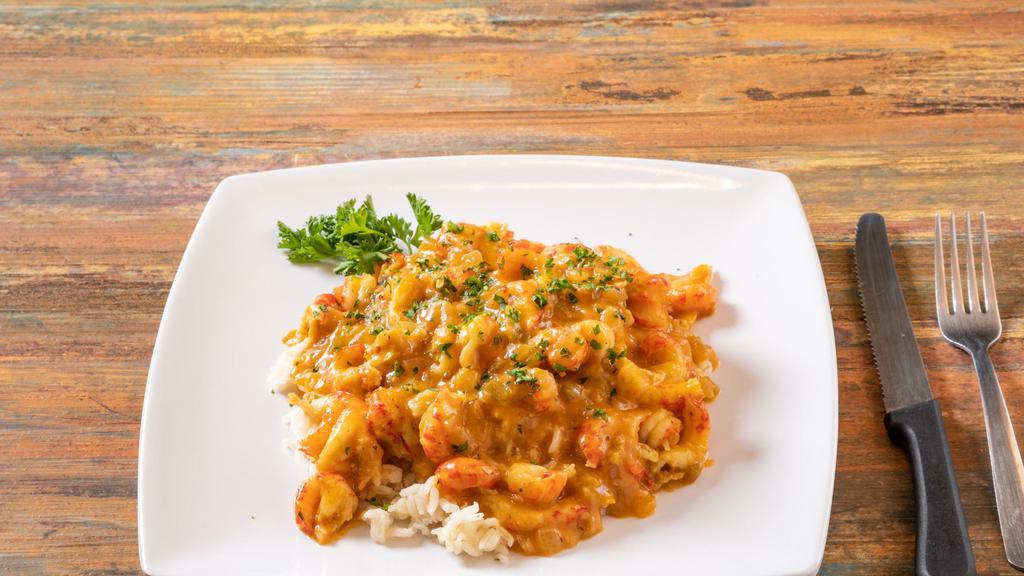 Crawfish Etouffee · Crawfish smothered in a buttercream sauce served over white rice.