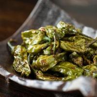 Shishito Pepper ** · Fried Japanese sweet peppers served with a sweet butter garlic soy glaze