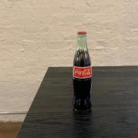 Coke (Bottle) · Coke in a Bottle.  Imported from Mexico.  Made With Real Sugar.  12oz