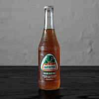 Jarritos - Tamarind · Jarritos Tamarind Soda.  Made with Real Sugar.  Natural Fruit Flavor.
