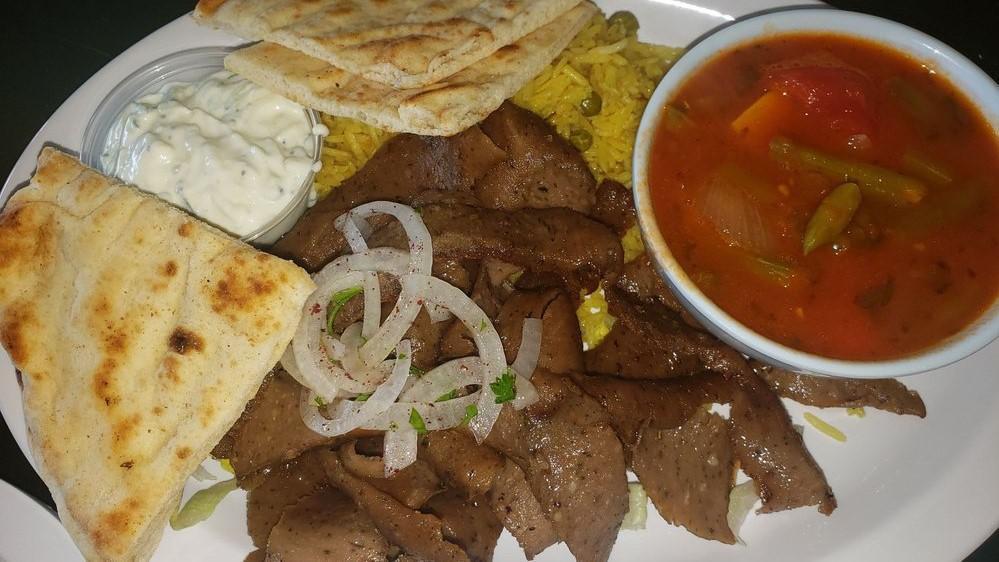 Gyro Platter · Rotisserie beef and lamb slices, served homemade tzatziki sauce and fresh pita bread. Greek salad, rice, and green beans.