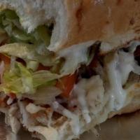 Chicken Bacon Ranch Sub · Grilled Chicken, Provolone cheese, Bacon crumbles, lettuce, tomato and Ranch dressing on a 9...